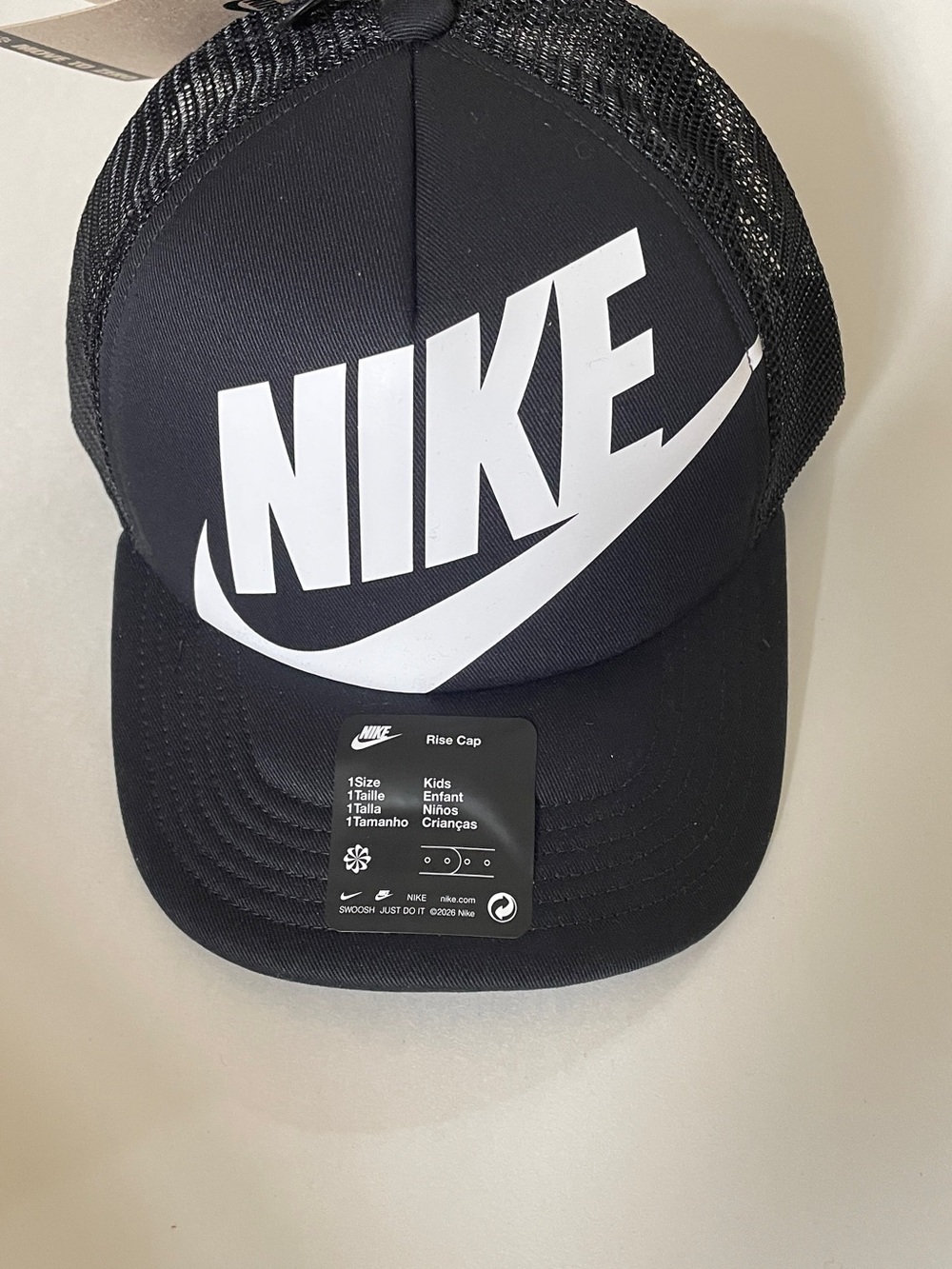 Nike Kids Black Trucker Cap with White Logo
